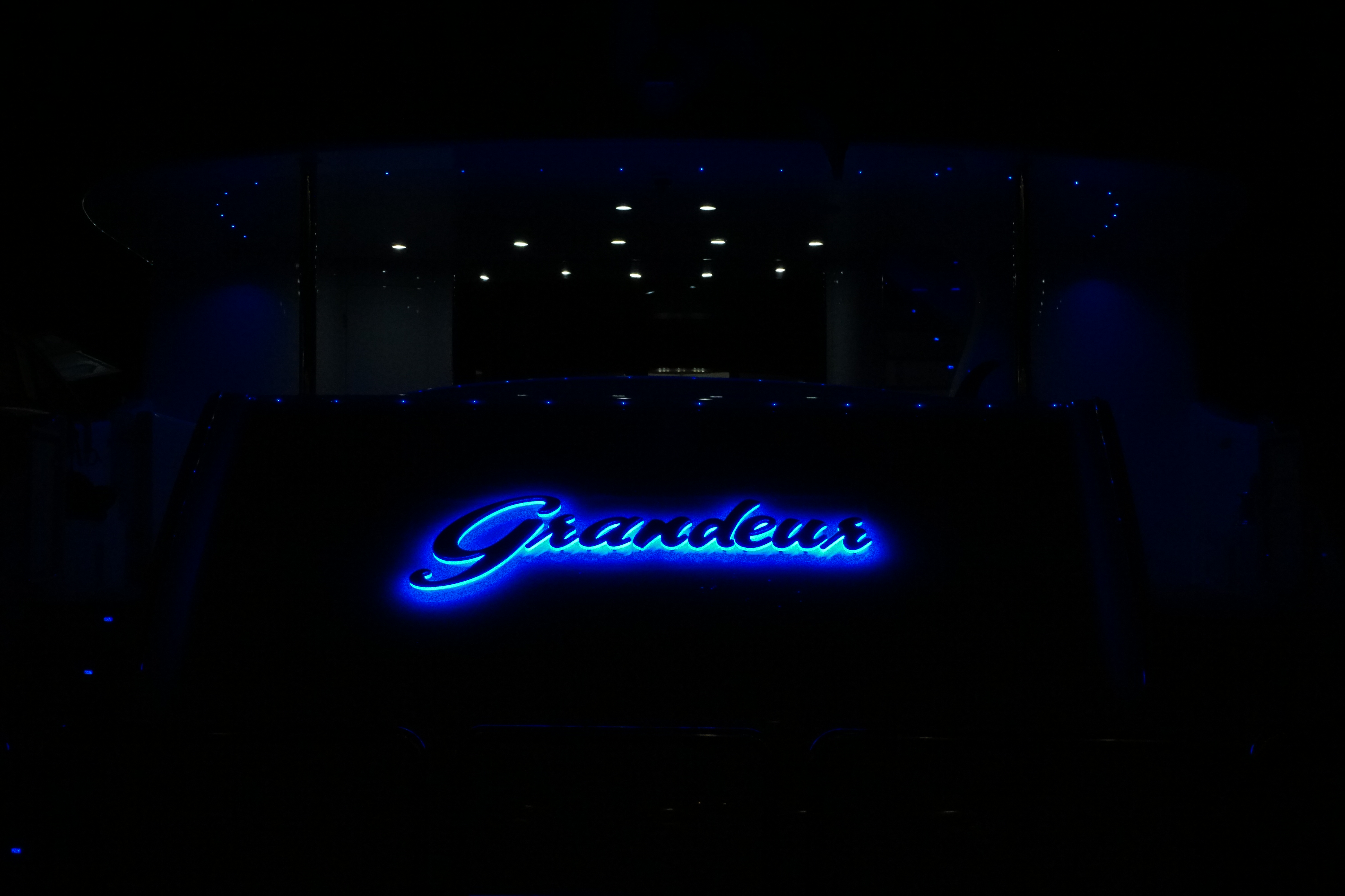 Granduer lettering in blue lights